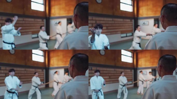 日本男子，合气道类和教练的战斗，现代武术和学习自卫。老师也好，学生也好，在生命中锻炼精力，在训练中坚