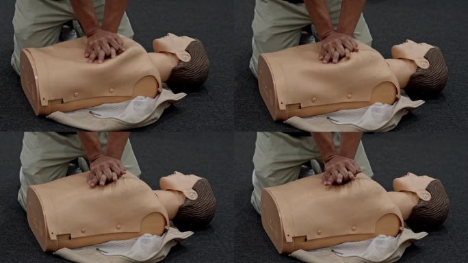 在工厂进行心肺复苏术人体模型的急救培训