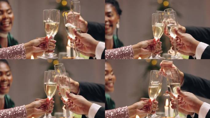 晚上，与商务人士一起庆祝新年，举杯共饮香槟。人们，男男女女，拿着酒杯，喝着或起泡酒欢呼，祝愿或快乐