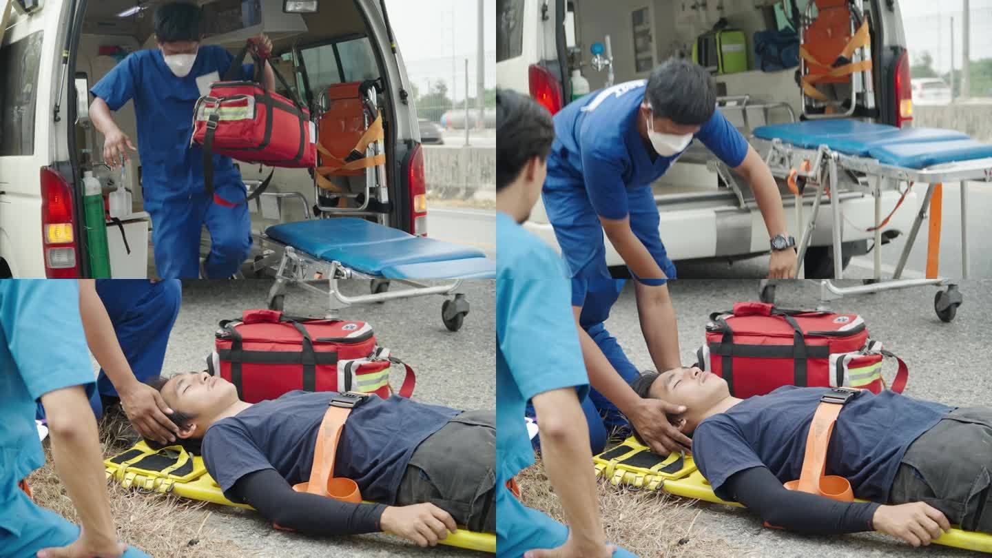 工作中的紧急医疗服务。医护人员在救护车附近进行急救。