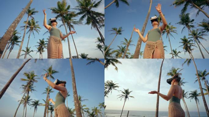 戴着VR头显的女人探索数字世界，在棕榈树中优雅地移动手臂。海上的虚拟冒险，与身临其境的模拟互动，在日