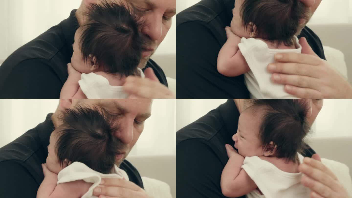 结合幸福:父亲和女婴分享温柔的拥抱，创造难忘的家庭回忆。