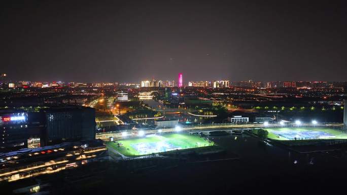 4K航拍郑州城市夜景北龙湖大玉米福塔