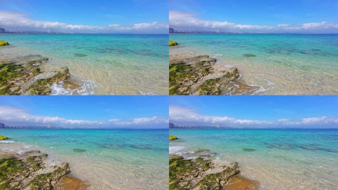 海南三亚海棠湾海岸线礁石沙滩海浪微距慢镜