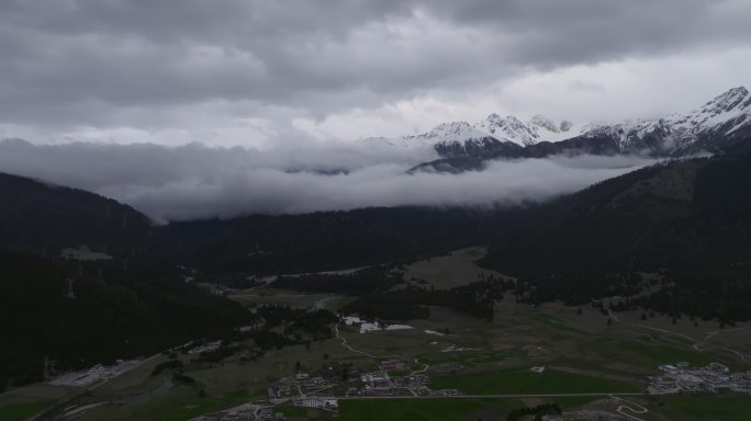 西藏林芝地区鲁朗小镇雪景高空航拍