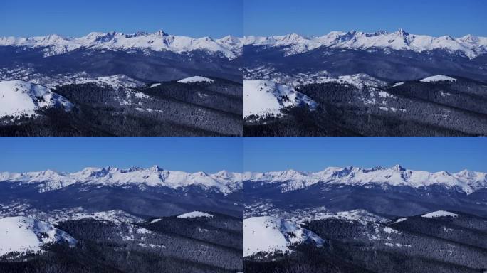 冬季山的圣十字荒野韦尔关科罗拉多州空中无人机落基山脉雷鸟山景观晴朗晴朗的早晨蓝天清新的雪圈左运动