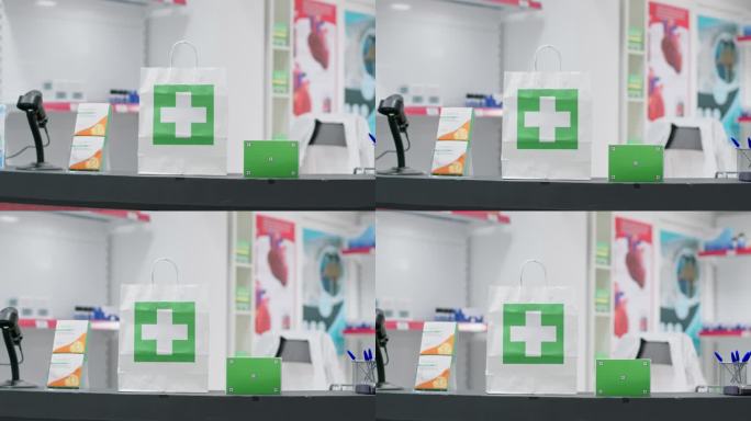 纸袋与药品和绿屏表面显示在药盒