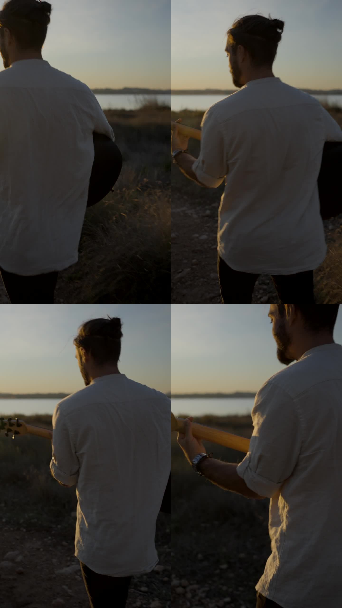 一个人拿着吉他，走向湖边去看风景如画的日落