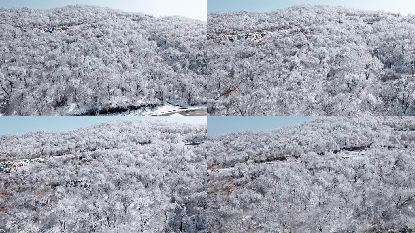 冬日山上雪景航拍与穿梭在山间的道路