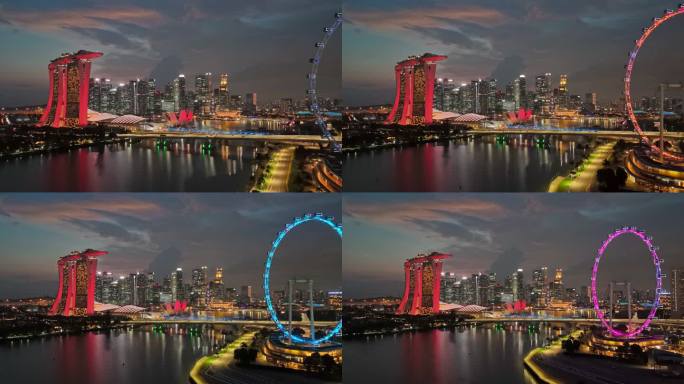 新加坡城市天际线的鸟瞰图。新加坡的滨海湾、灯火通明的摩天大楼和夜晚的十字路口