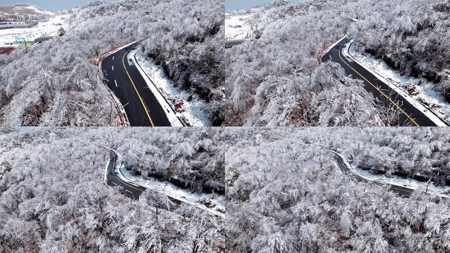 冬日山上雪景航拍与穿梭在山间的道路