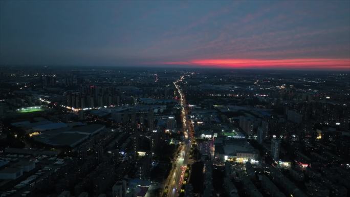 航拍城市街道晚霞夜景