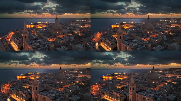 从空中俯瞰马耳他瓦莱塔的城市灯光。在马耳他瓦莱塔旧城的日出。UHD 4 k