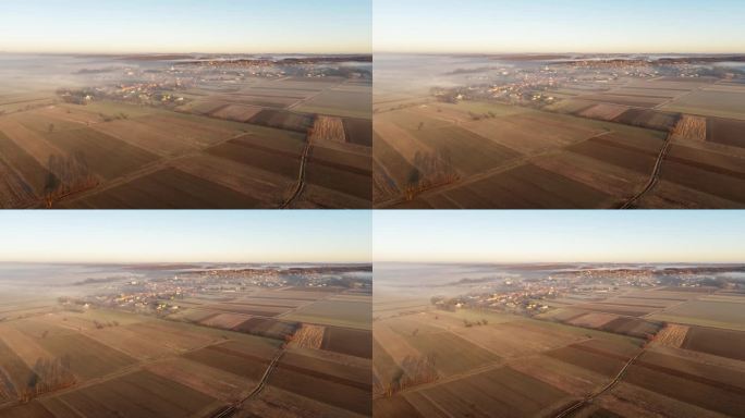 无人机拍摄农村农作物和城镇上空的雾气