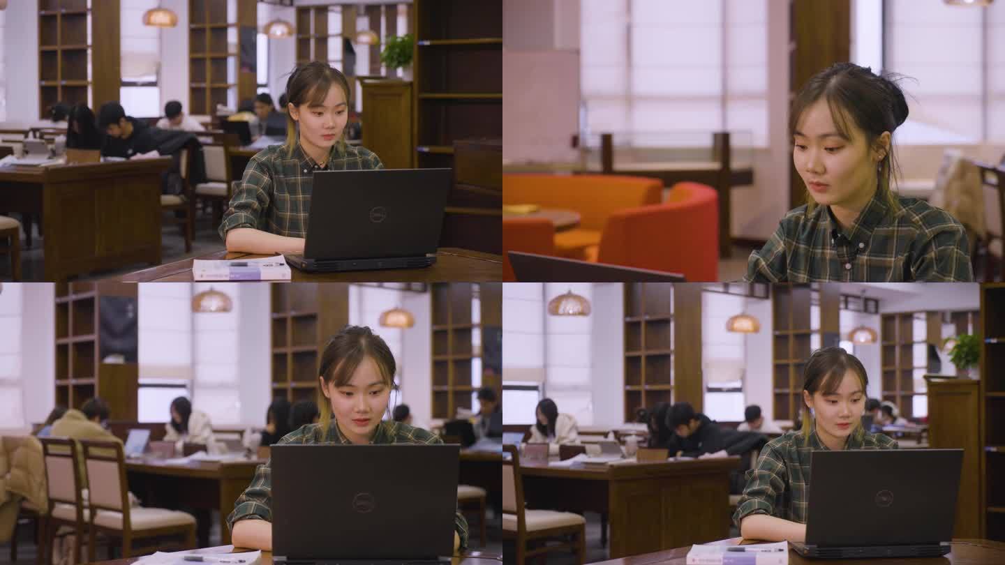 女生在自习室电脑办公学习