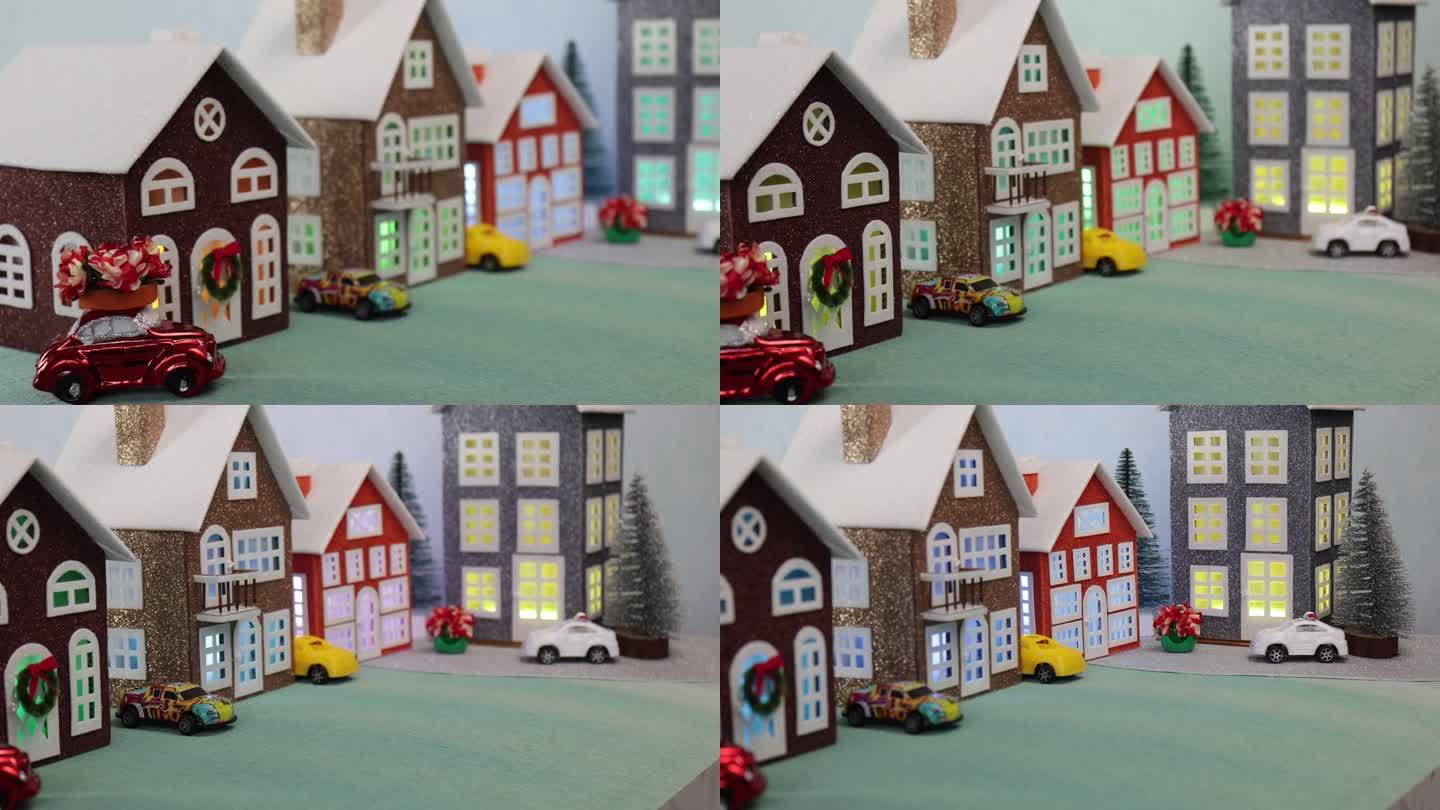 一个小镇的特写，大大小小的可爱的房子，附近有五颜六色的汽车