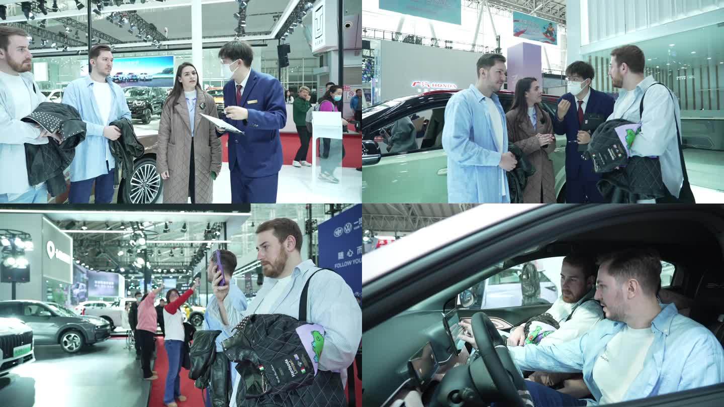 比亚迪新能源车展外国人逛车展销售介绍车