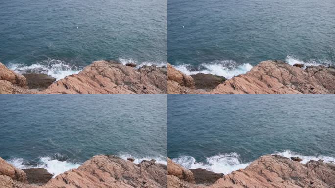 海水海浪拍打海岸岩石蓝色海水拍打海岸浪花