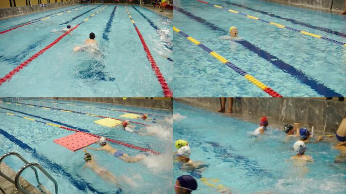 小朋友们在游泳馆里学游泳比赛