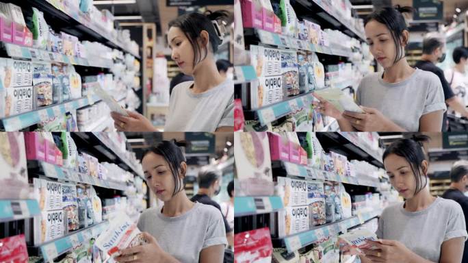 在超市购物的亚洲妇女。