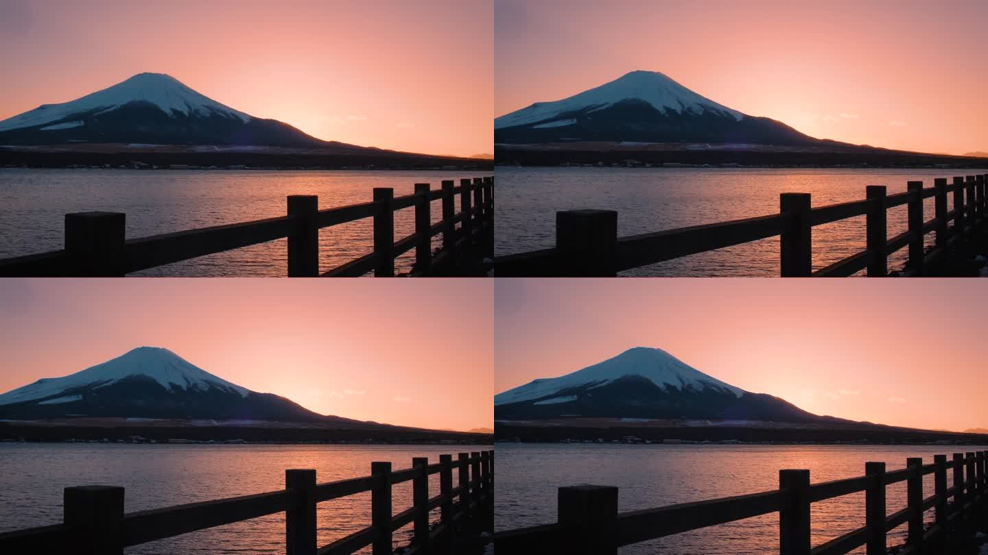 黄昏时分的富士山，落日映照在川口湖上，川口湖是游客和旅行者的地标和目的地。宁静夜晚的自然之美