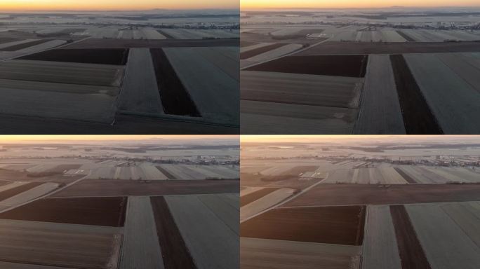 无人机在宁静的农村农田作物上拍摄霜冻