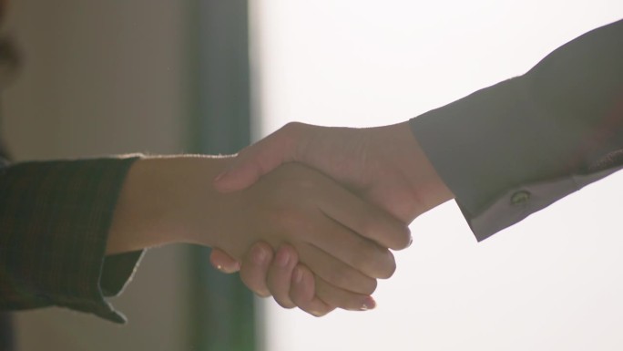 握手商务人士握手成功的企业伙伴关系交易