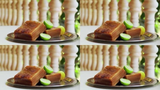 贝宾卡-传统的葡萄牙甜点在果阿，印度。由面粉、椰奶、糖和香料制成的甜分层蛋糕。静态电影镜头。