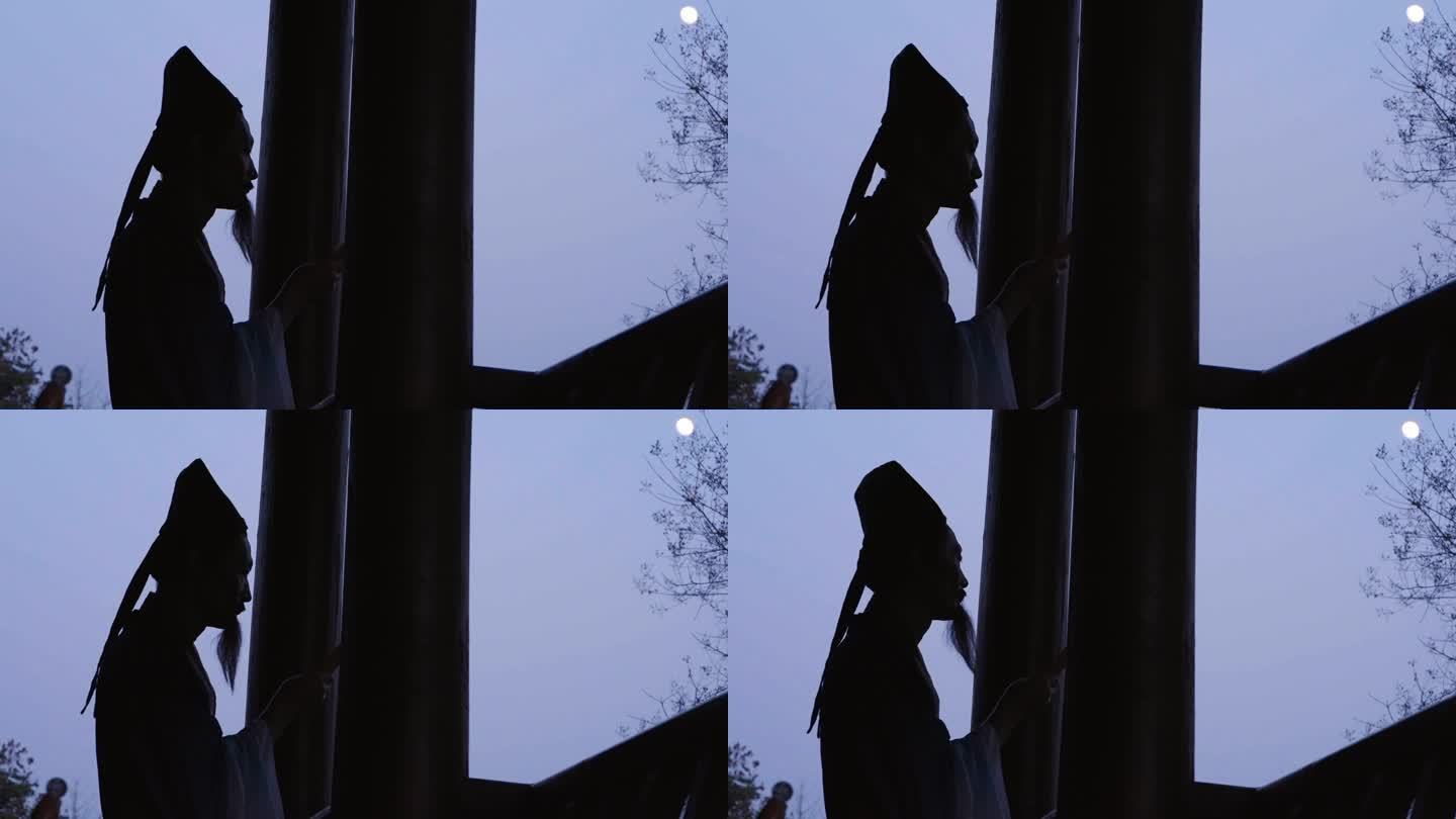 古代人物傍晚站在楼阁看月亮思考剪影