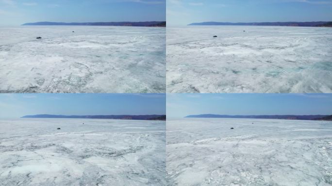 一艘气垫船载着游客穿越贝加尔湖的冰层。