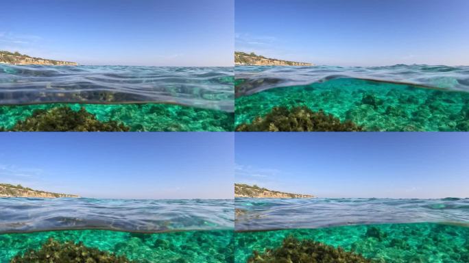地中海的半水下景观与清澈的绿松石水。湛蓝海水的穹顶照片。慢镜头，4K