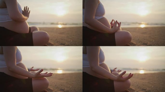 孕妇在海滩上冥想冥想