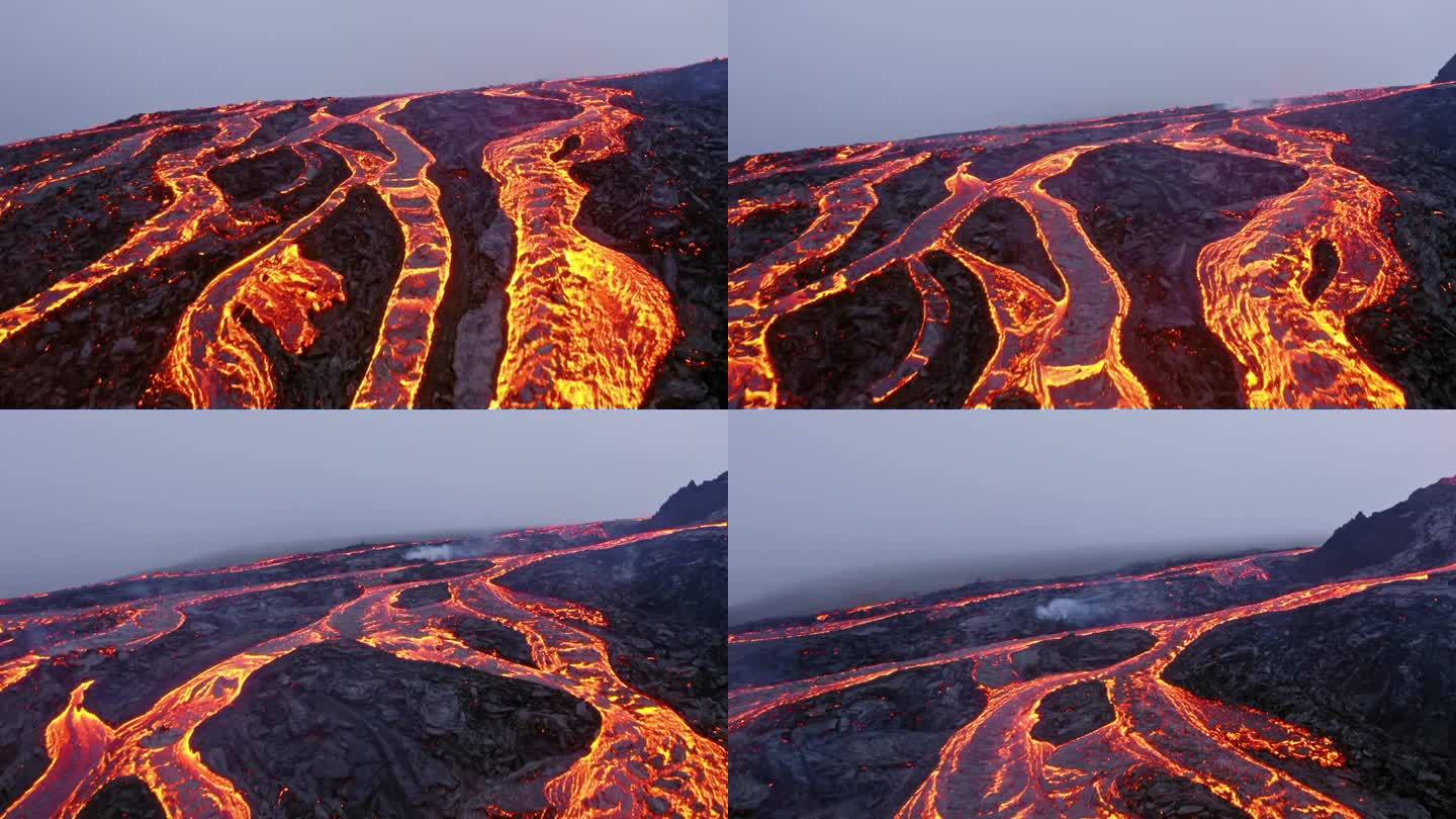由4K无人机拍摄的戏剧性和独特的电影航拍镜头，展示了层叠的熔岩形成，类似于静脉或树根。