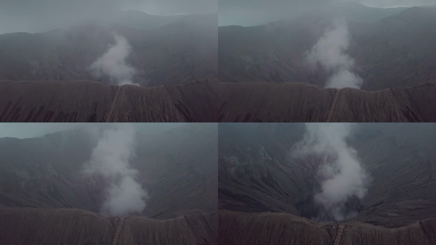 无人机鸟瞰图:布罗莫火山火山口边缘与蒸汽，亚洲。旅游目的地探险自然的概念