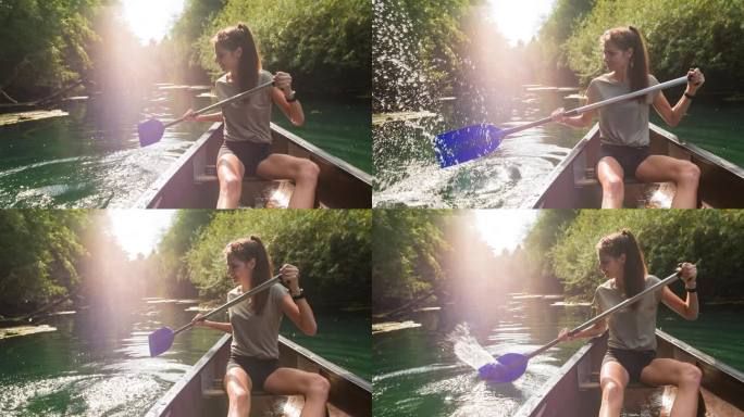 女人在独木舟上享受夏日，用桨溅水