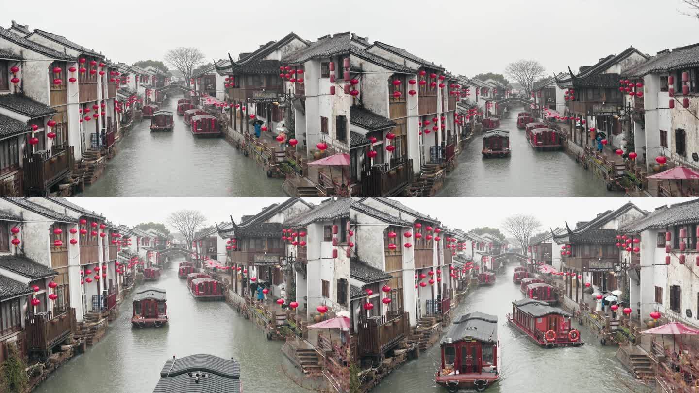 江南水乡江南古镇苏州山塘街雨中游船