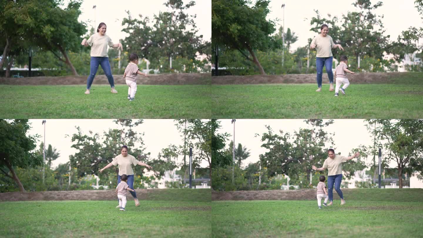 母亲和儿子在户外公园玩耍