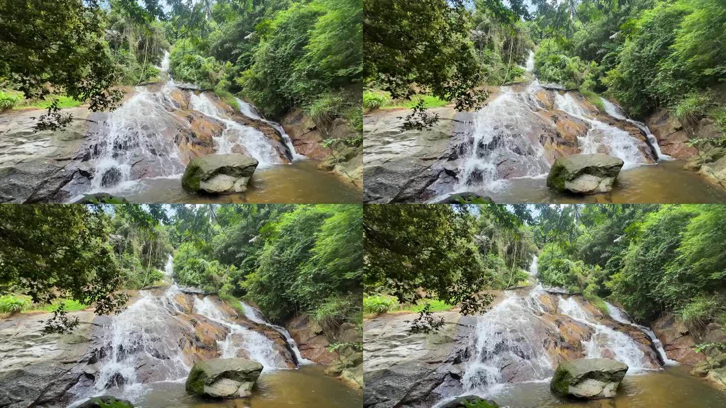 美丽的Namuang 2瀑布，隐藏在泰国苏梅岛郁郁葱葱的丛林中，提供了一个宁静而风景如画的大自然的拥