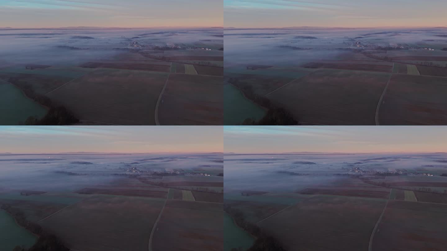 黎明时被雾笼罩的农田鸟瞰图