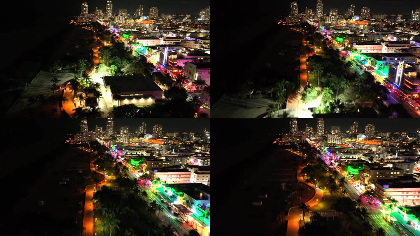 佛罗里达州迈阿密南海滩的夜间无人机视图飞越海滩与海洋博士的观点。