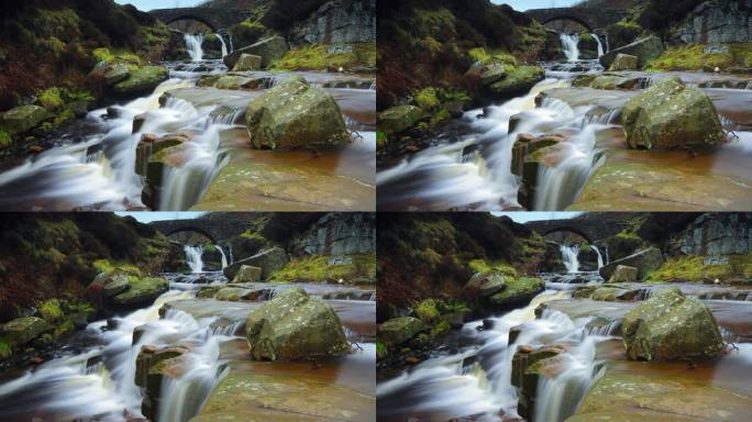 英国的《三郡头》(Shot of Three Shires Head)展示了水从石头上流过，水里有一