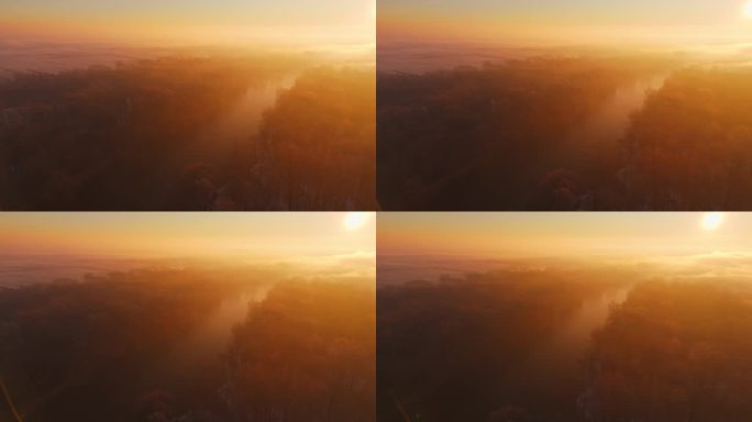 日出时穆尔河和森林树木的鸟瞰图