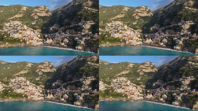 著名的旅游胜地阿马尔菲海岸-波西塔诺。意大利波西塔诺村，在色彩缤纷的房屋、教堂和绿松石般的海滩上空飞