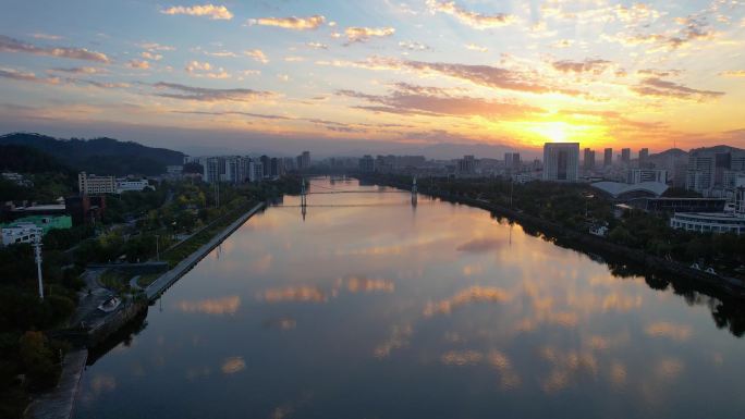 黄山城市夕阳晚霞徽派建筑新安江风光航拍