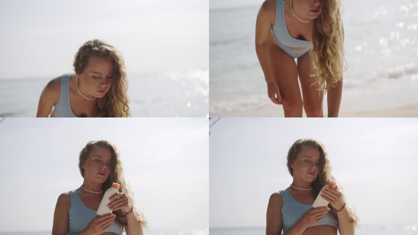一名女子从海里出来，在海滩上抓起防晒瓶，以保护皮肤安全。彻底涂抹防晒霜，享受海边度假，优先使用防晒乳