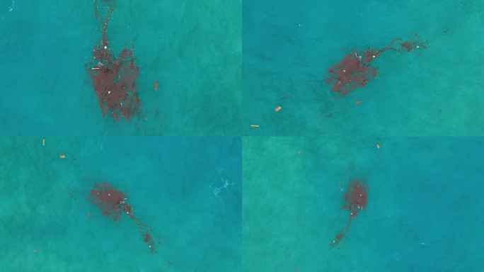 无人机鸟瞰图旋转上升在海洋中间的垃圾海洋碎片漂浮补丁