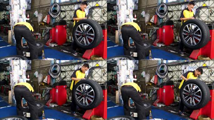 车轮平衡器在工作，以控制的速度转动合金车轮。
