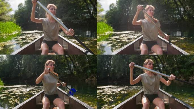 活跃的年轻女子在河上划着独木舟