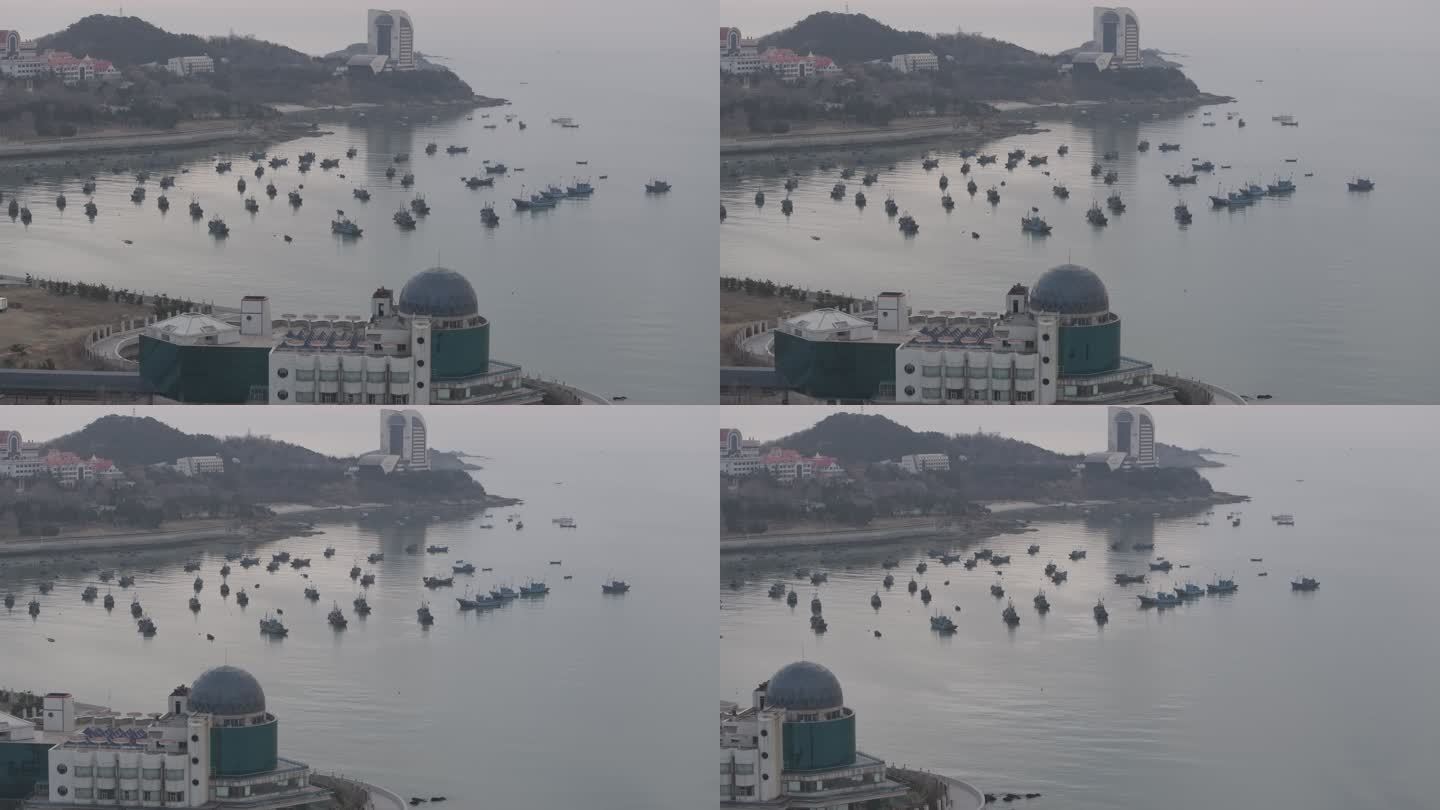 航拍威海市环翠区合庆湾清晨海面停泊渔船