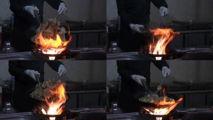 厨师在锅里炒菜炒鸡的慢动作
